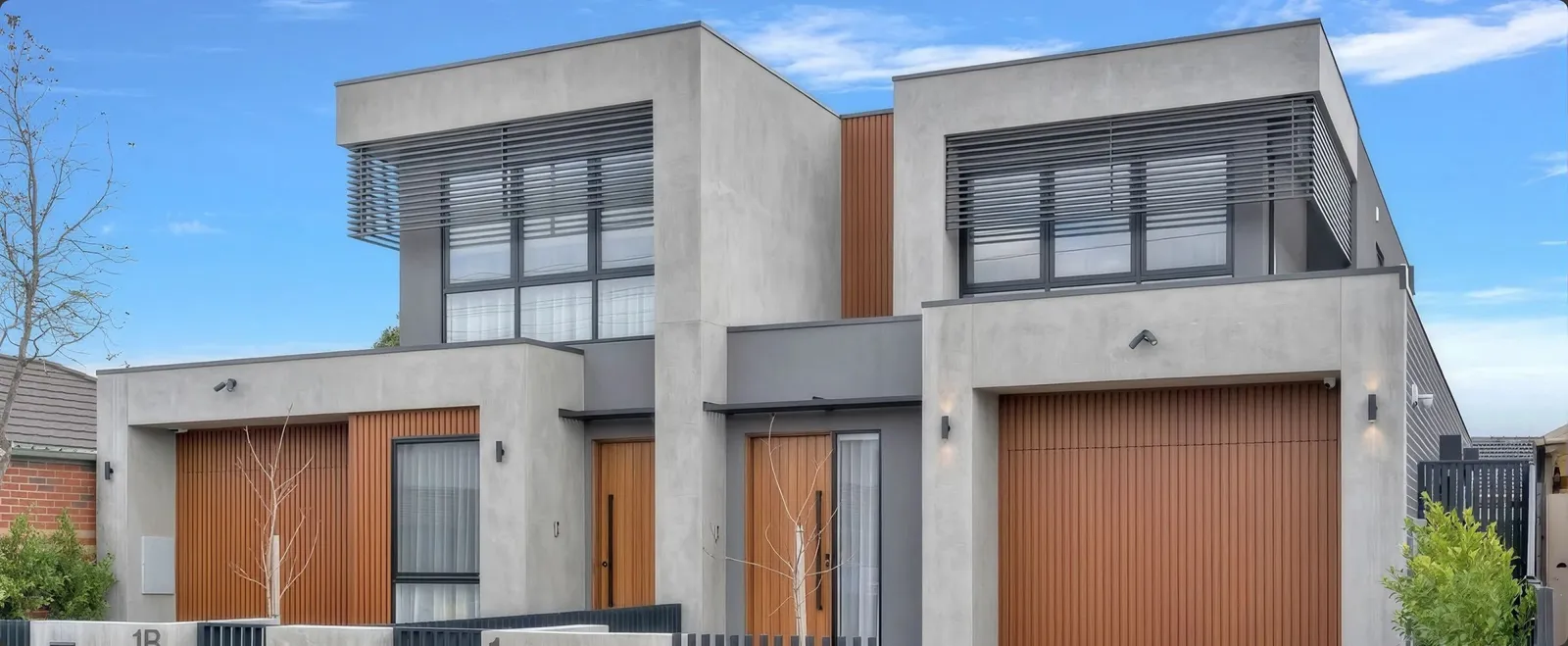 Two side-by-side townhouses built on a single block in Avondale Heights